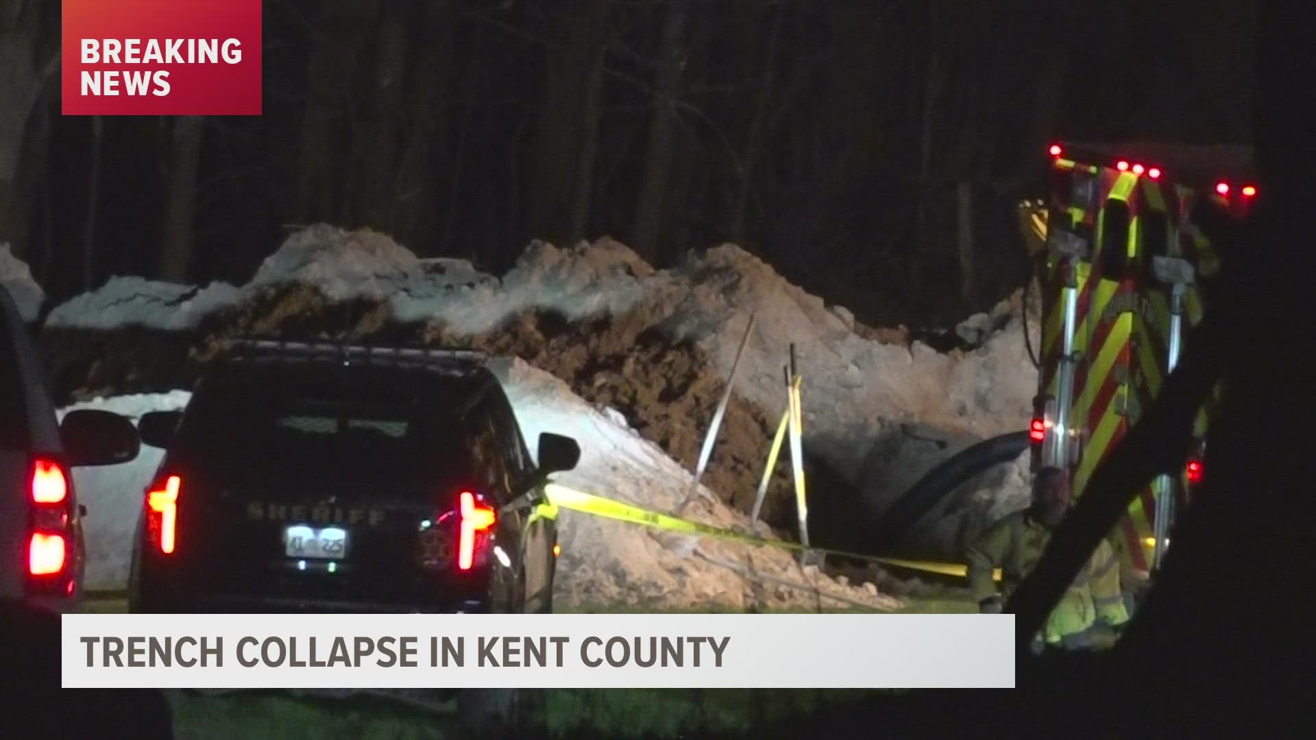 The Kent County Sheriff's Office says a 14-foot trench was being constructed in preparation for a pole barn, when it collapsed, trapping two people underneath.