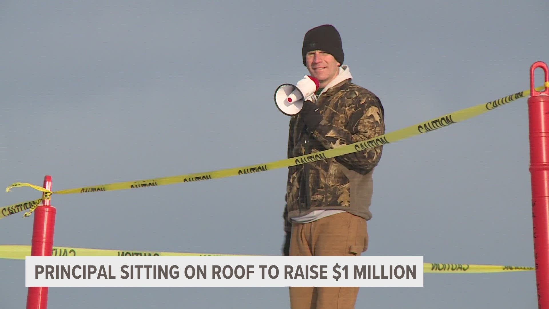 Principal Joe Oosterheert is staying on the roof of Jenison Christian School until $1 million is raised.