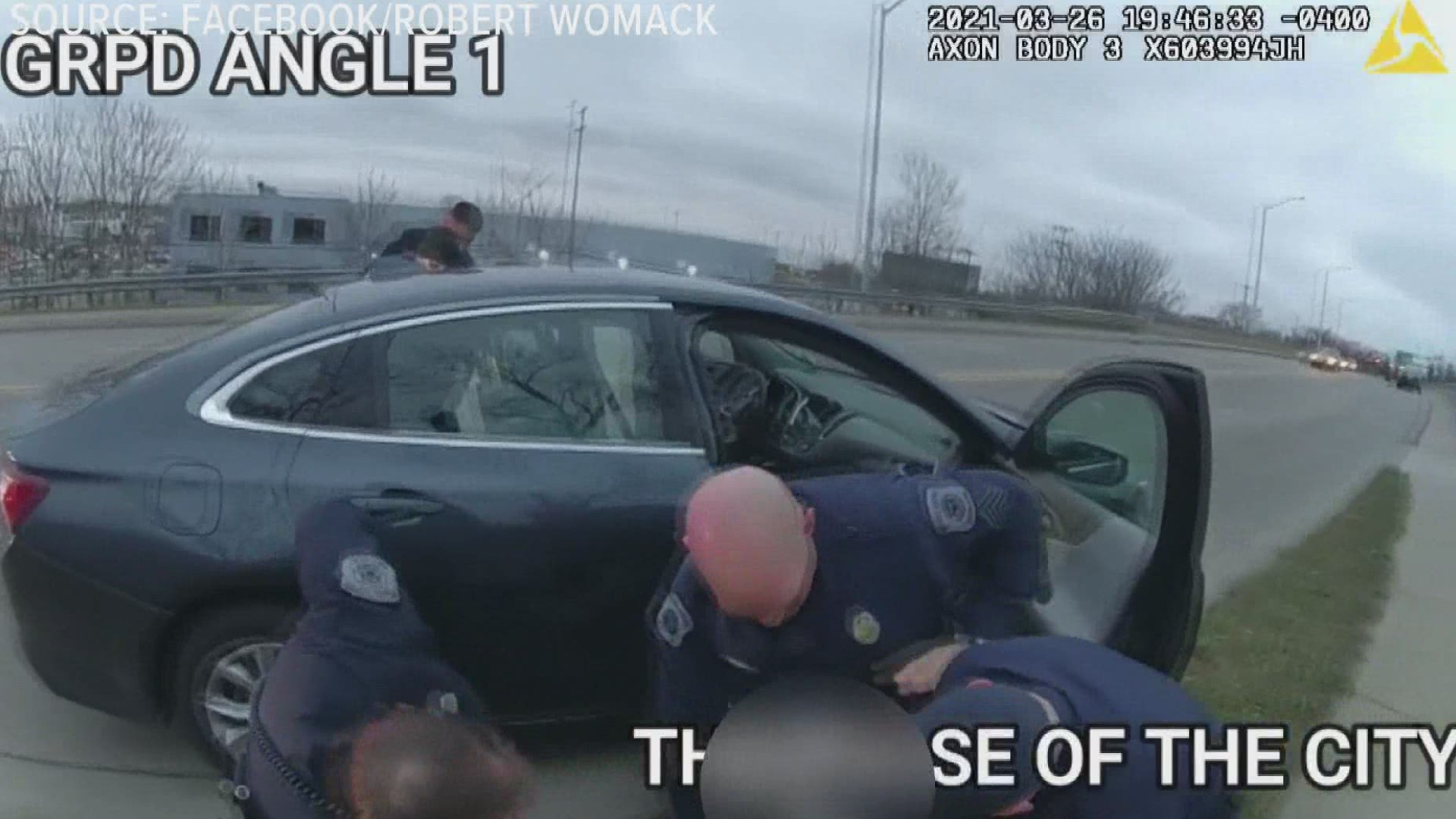 In the body cam video from March 26, police pull over three men in a car at South Division and Hall Street.