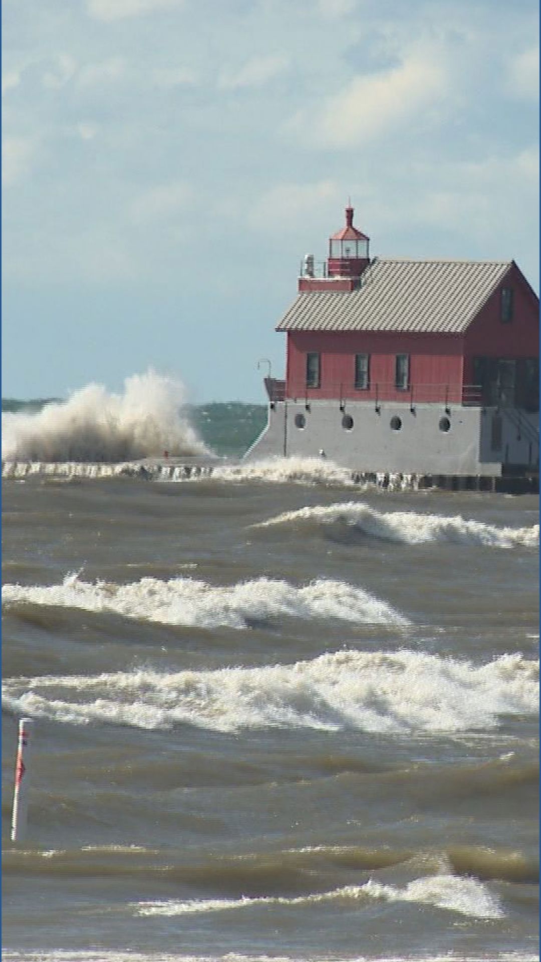 Strong Winds Create Massive Waves and sand drifts in Grand Haven ...