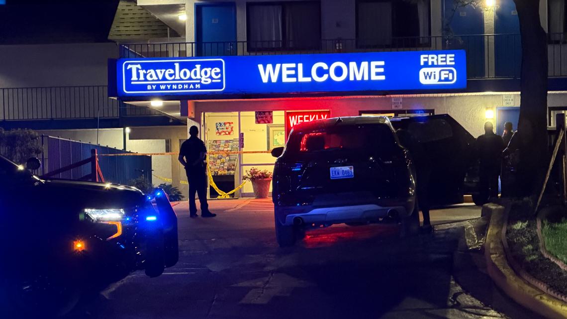 2 injured, person of interest in custody after shooting at Travelodge on Alpine Ave