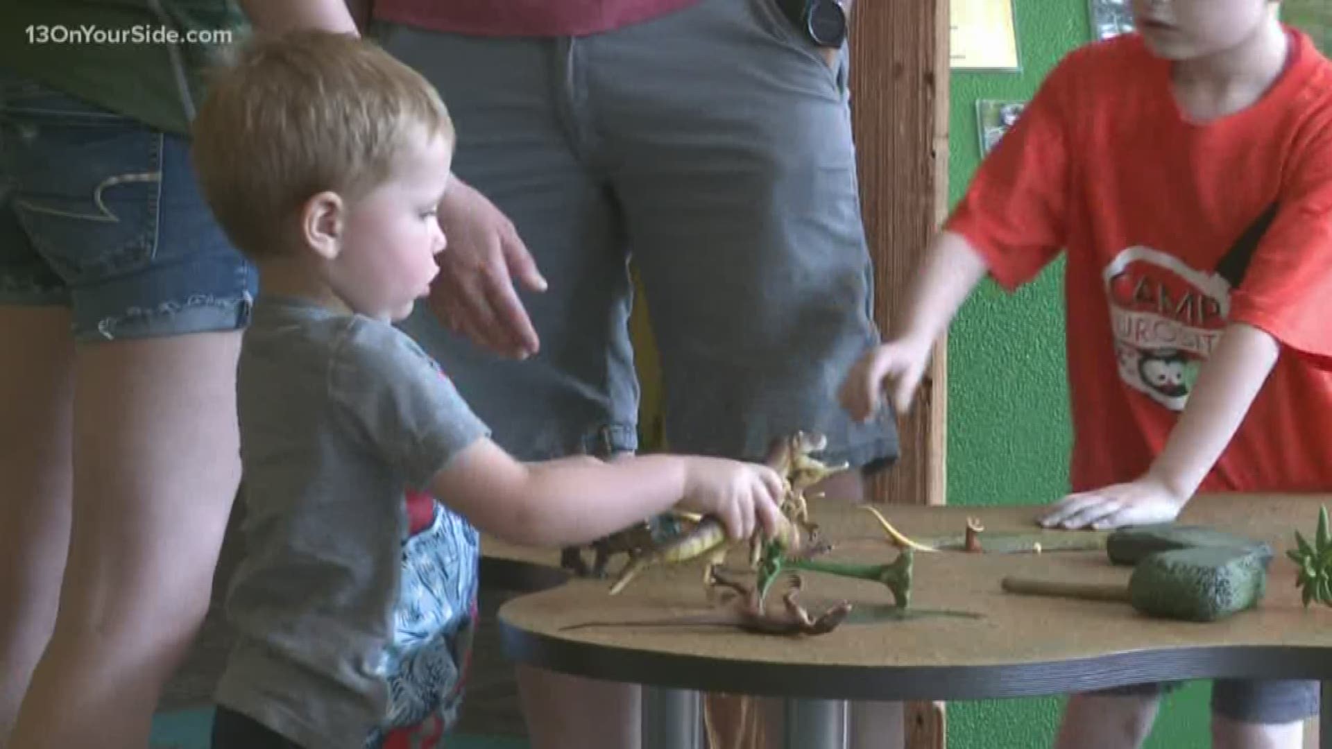 The Grand Rapids Children's Museum is rooted in the belief that learning can come through hands-on fun and play, and the dinosaur exhibit allows for that.