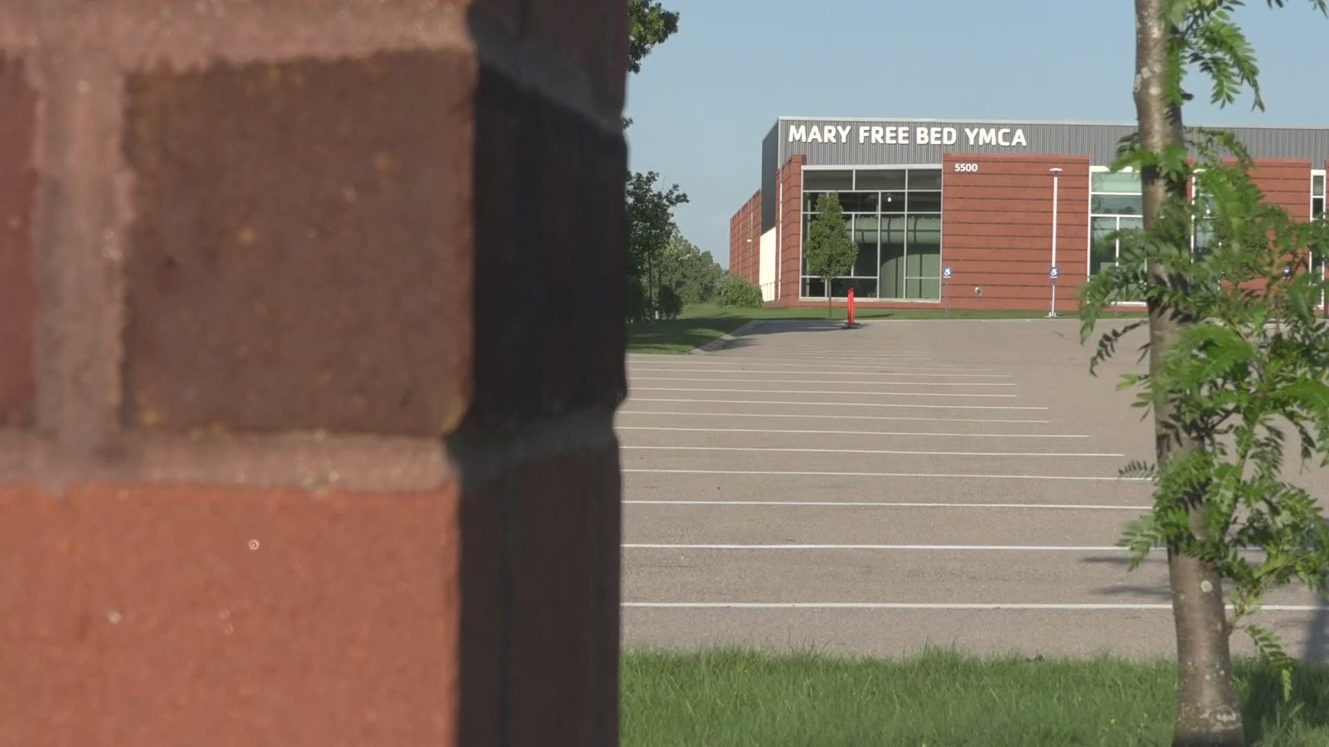Staff were laid off at seven YMCA locations in Kent County.