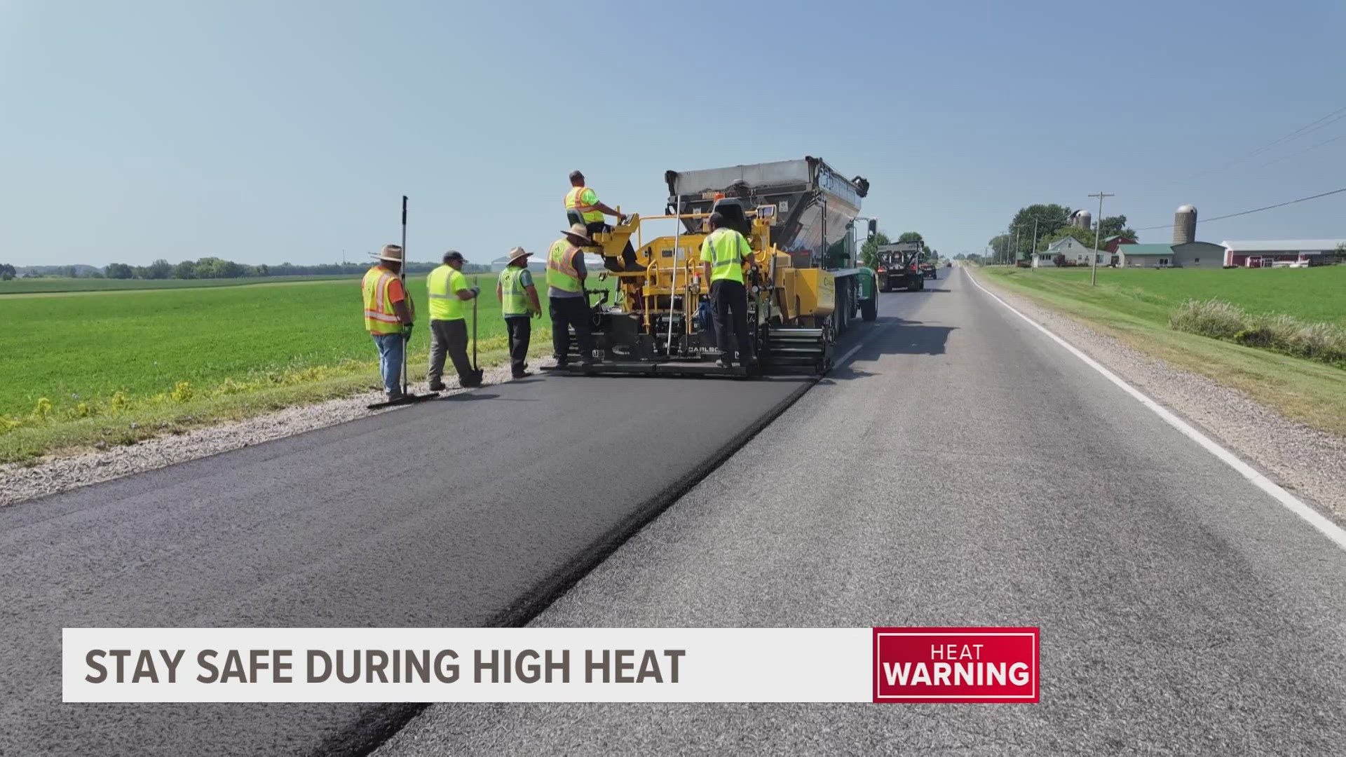 Workers with the Kent County Road Commission are working outdoors, next to 350-degree asphalt. They plan for days like this to stay safe.