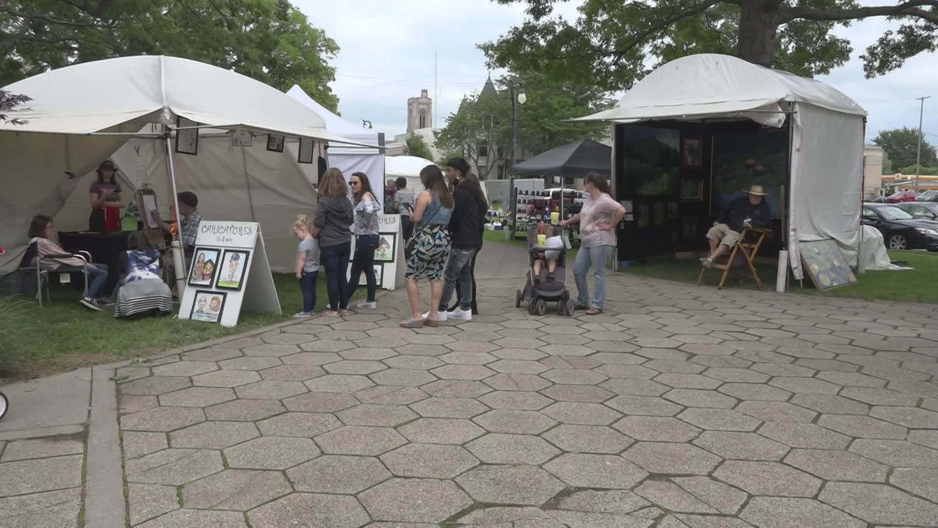 The Lakeshore Art Festival was shut down Saturday due to storms, but art vendors were back at it Sunday.