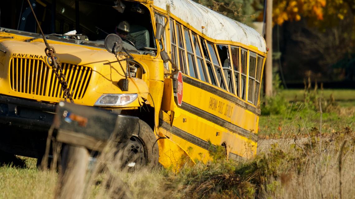 Minor injuries reported after Ravenna school bus overturned, hits power ...