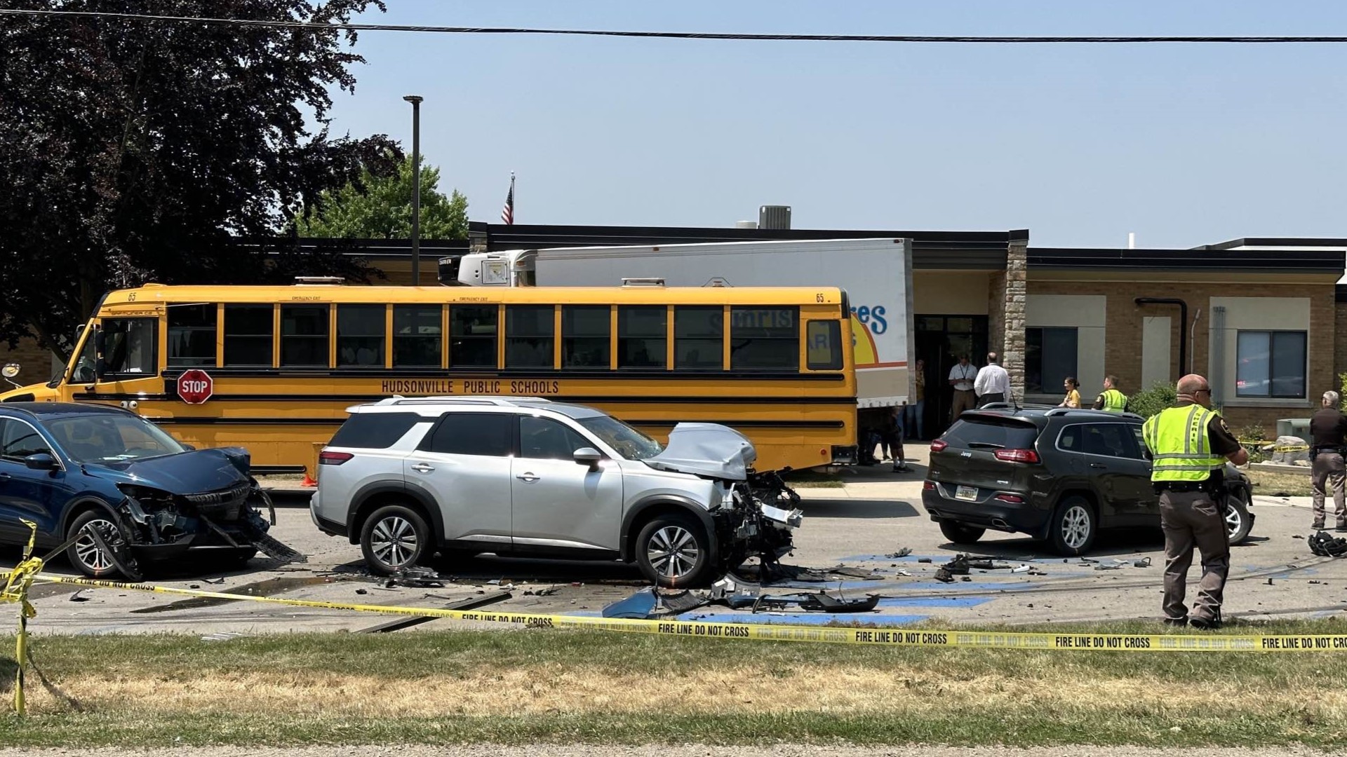 A pedestrian was seriously injured in the crash at Forest Grove Elementary School. The box truck also struck a school bus and 5 other vehicles.