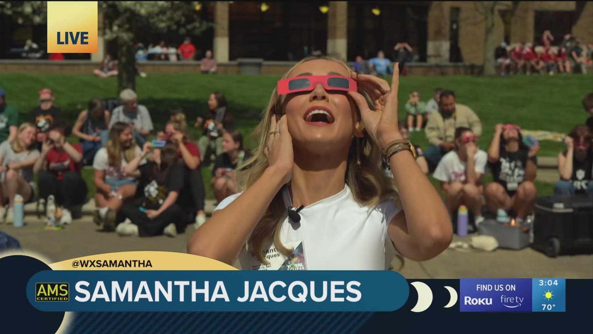 Eclipse watchers in Richmond, Indiana see darkness surround them as the total solar eclipse reaches totality.