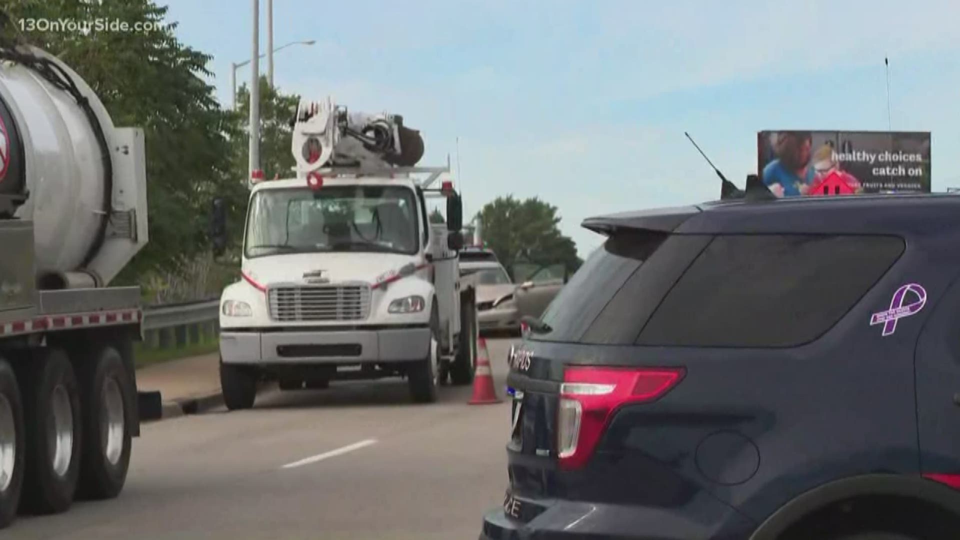 Grand Rapids Police said a construction crew worker was hit and killed after a driver on the Hall Street bridge over US-131 drove around a construction barrier.