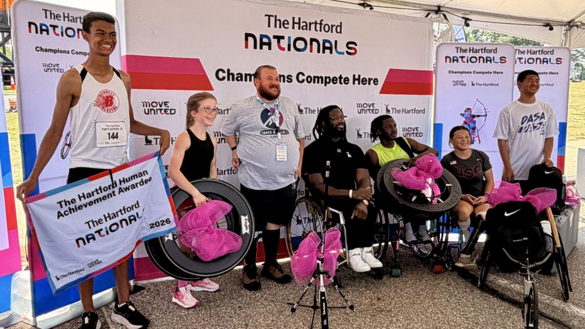 Athletes receive custom adaptive equipment at massive event in Grand Rapids
