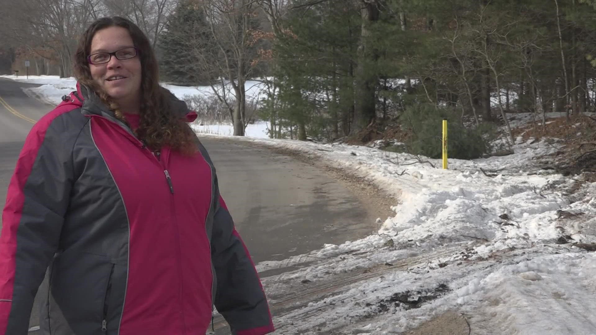 Stefani Mock was driving home from babysitting when she saw a red truck slam into a tree and catch fire in Muskegon County.