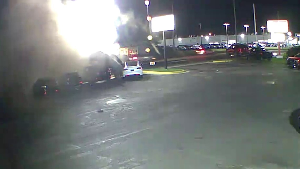 Multiple vehicles damaged in crash at GR used car dealership