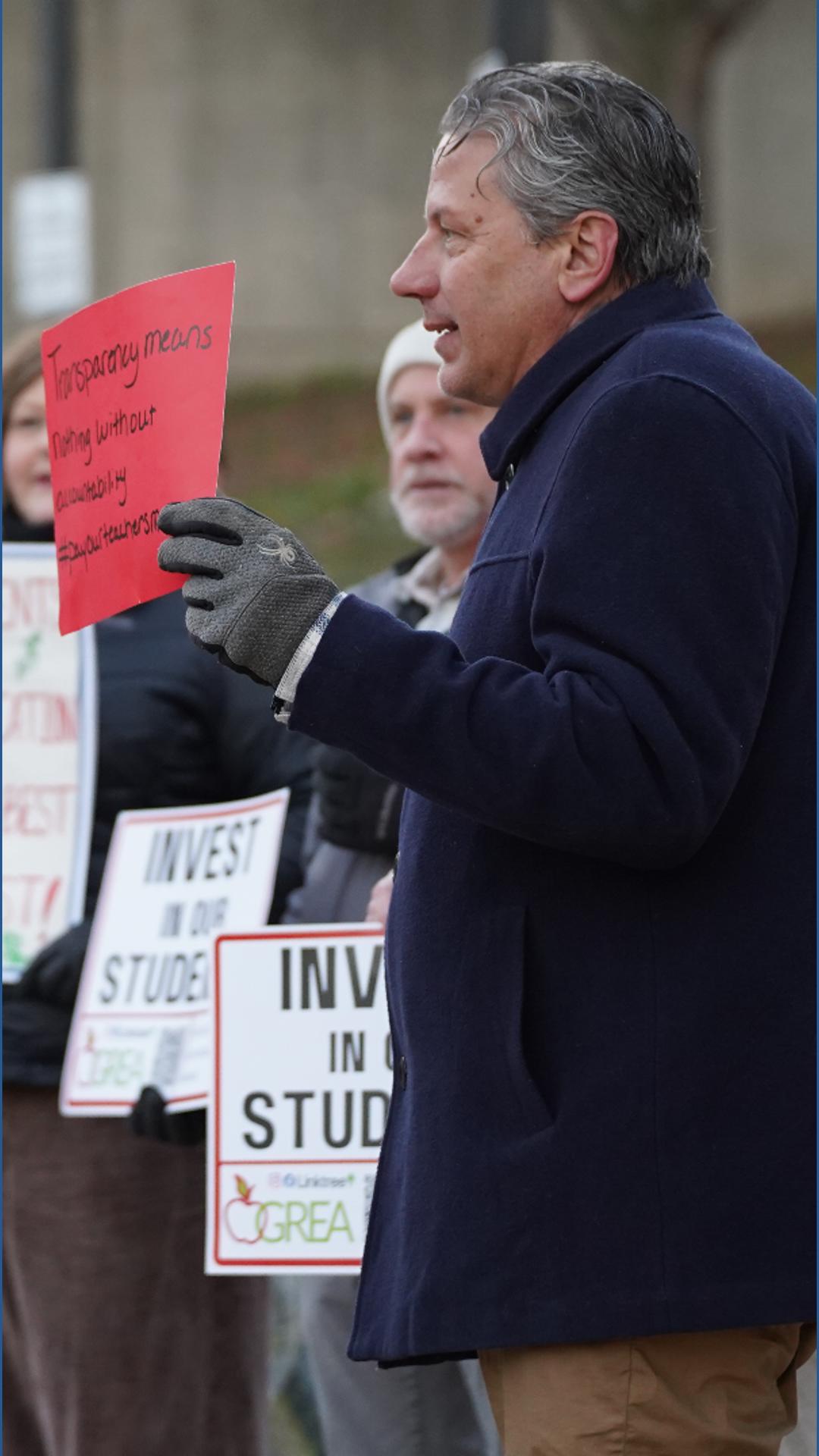 Grand Rapids teachers rally for higher pay amid contract talks | wzzm13.com