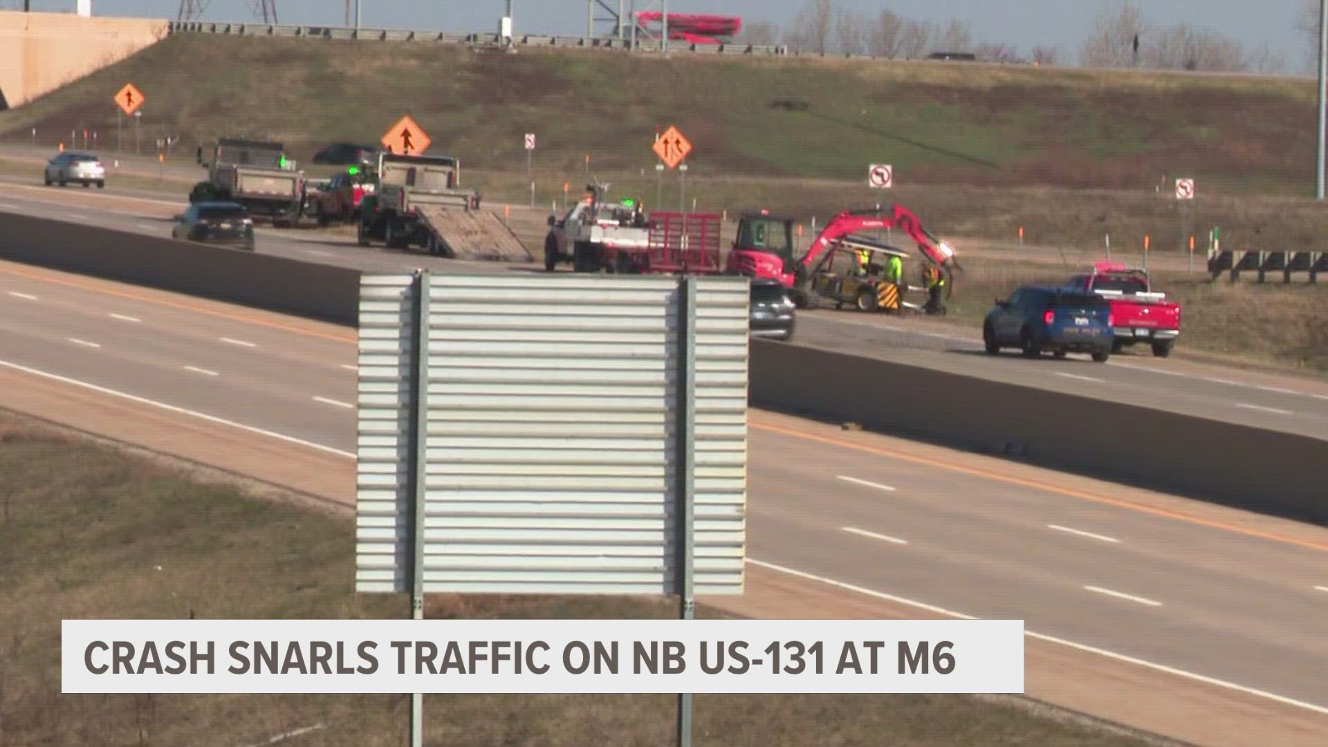 A driver ran into the back of a Kent County Road Construction vehicle, Michigan State Police say. The road worker was not injured.