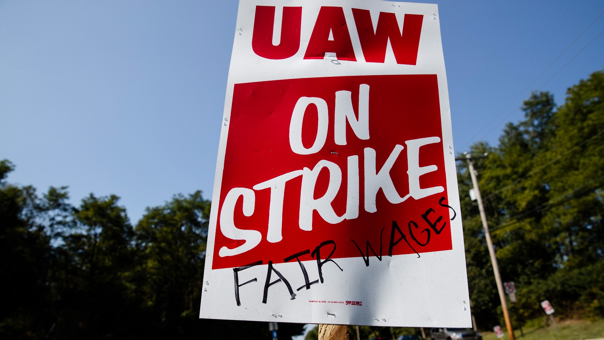 Local economists say a prolonged strike could cost West Michigan's economy as much as $150 million a week.
