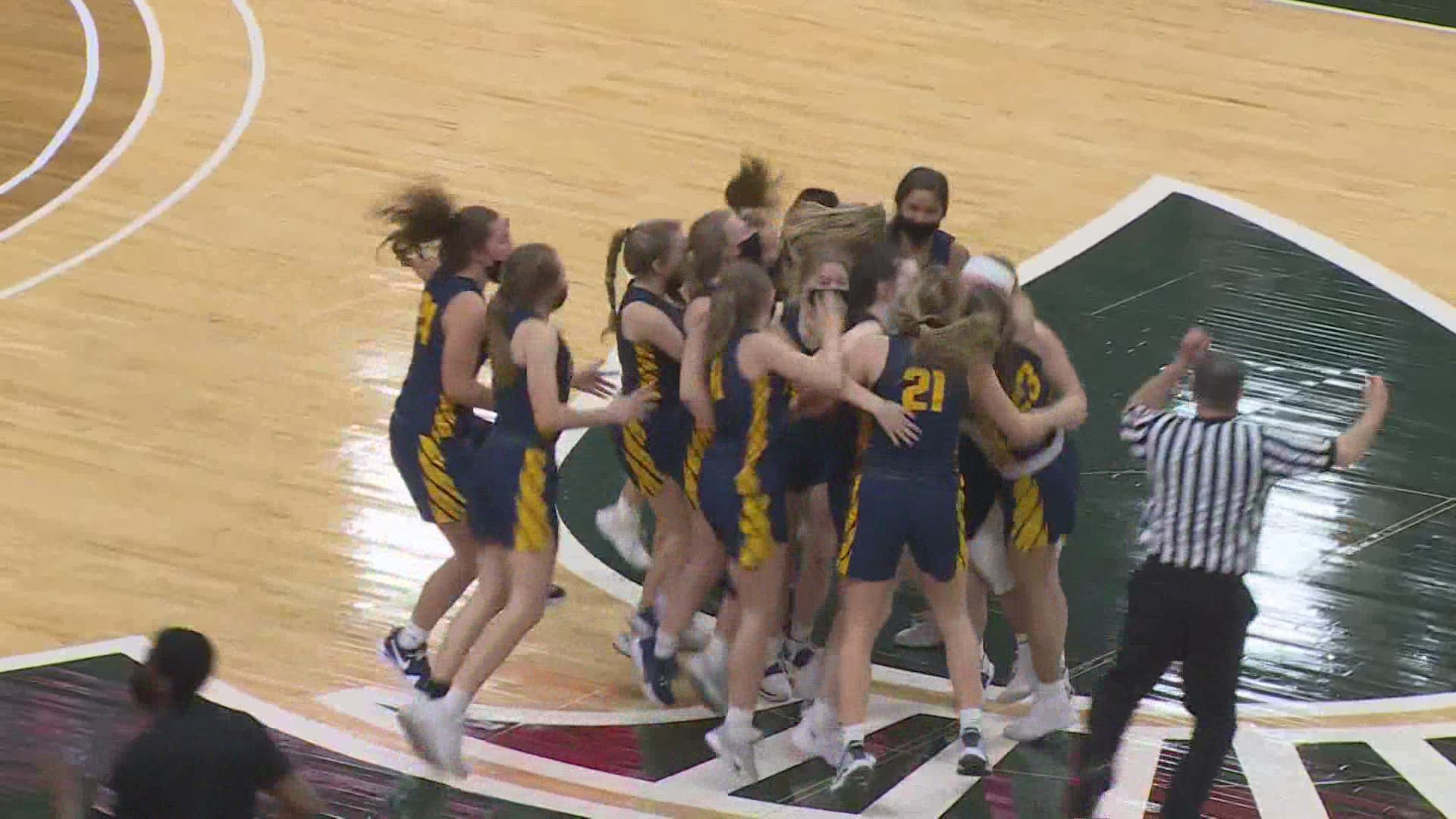 Hudsonville hangs on for its first state title ever. 65-61 the final.