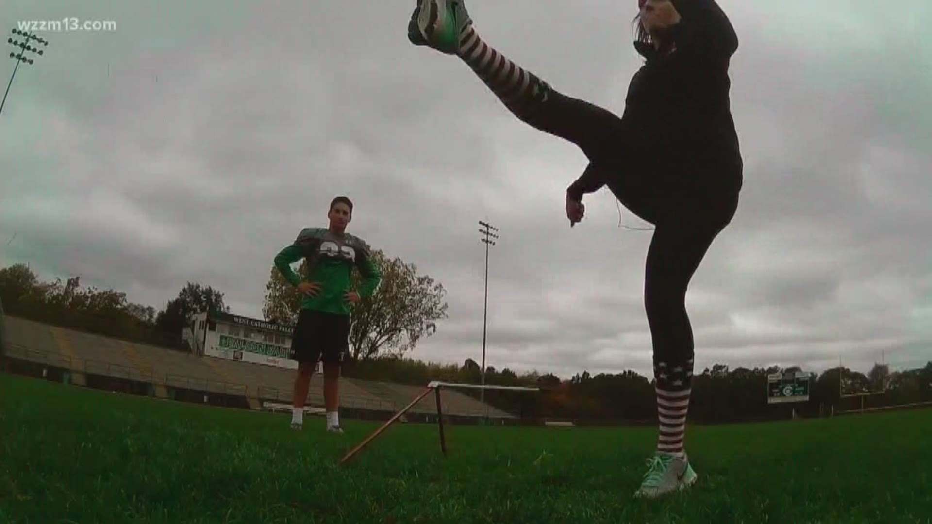 Kamady learns how to kick a field goal from the state champion kicker at West Catholic High School.