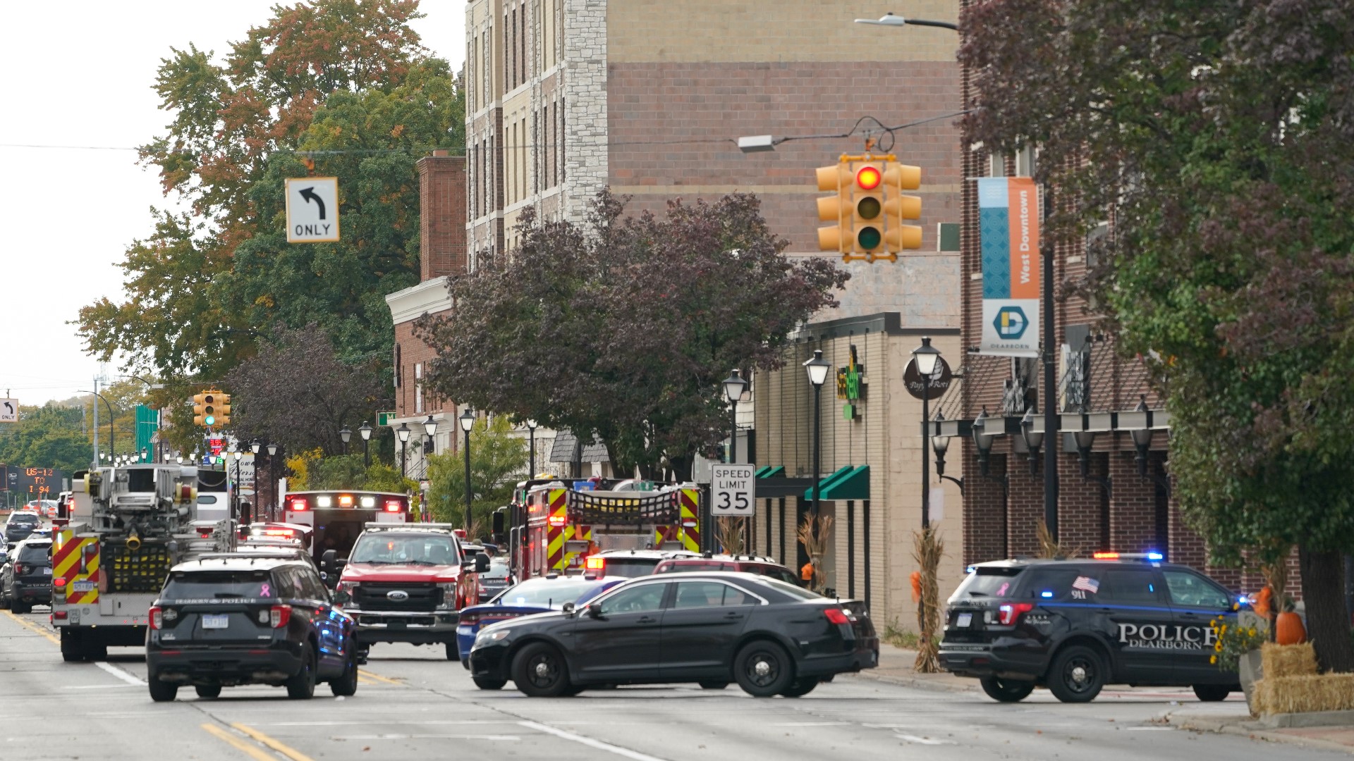 Shooting suspect in hotel near Detroit surrenders, taken into police