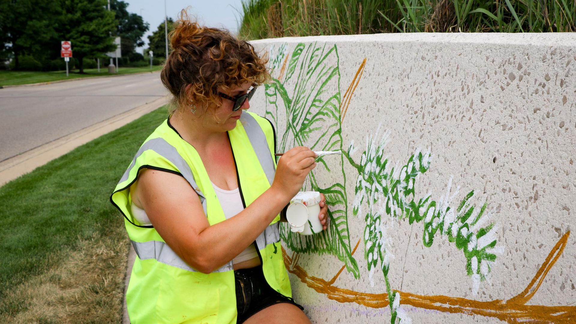 Visitors will see Dania Grevengoed's artwork of native Michigan plants as they leave or enter the airport.