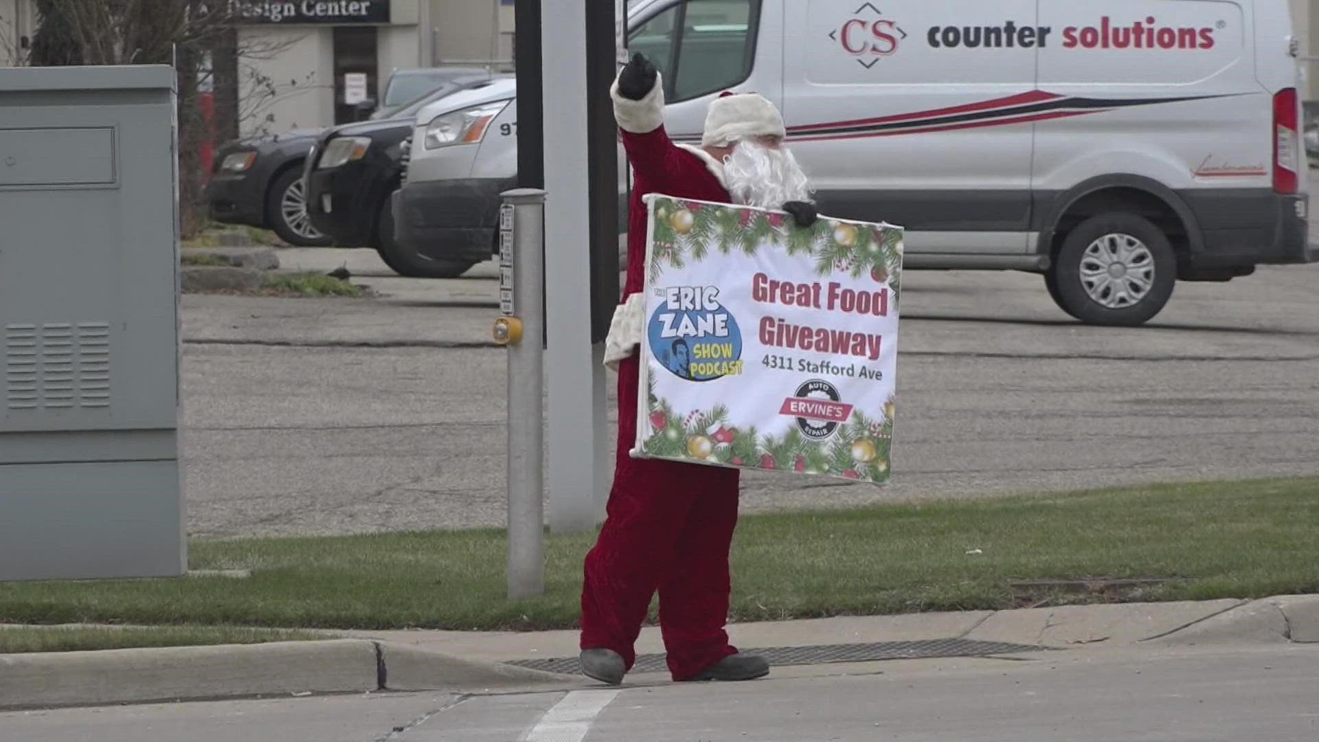 Each car got a box with a full dinner including a spiral ham, a bag of potatoes, corn, gravy, rolls, and a pie.