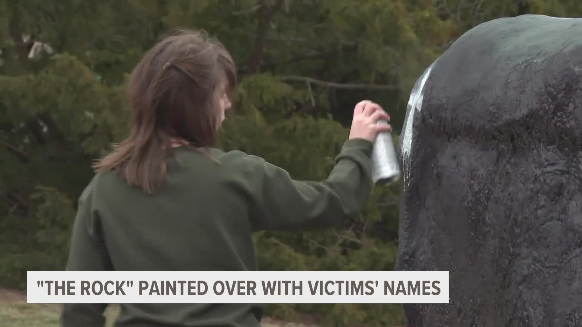 This is the third time The Rock has been repainted in two days, highlighting the conflicting opinions about gun control in the U.S.