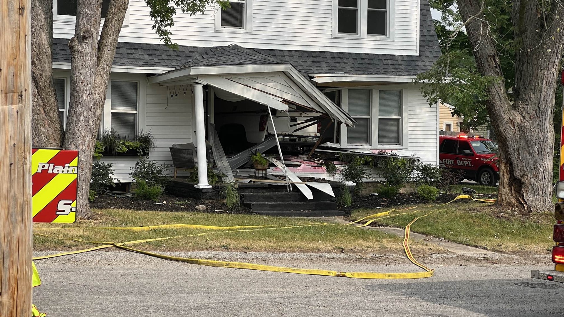 Truck crashes into home in Comstock Park