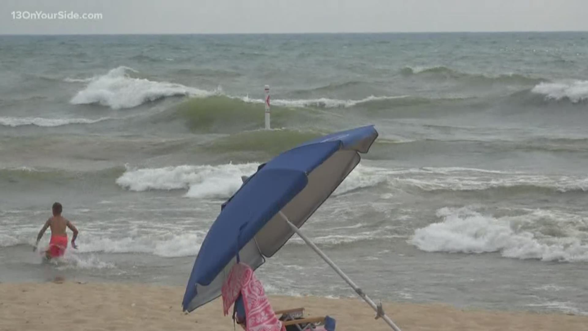 Planning to go to a Lake Michigan beach Monday? The National Weather Service says bathers should think about another day.