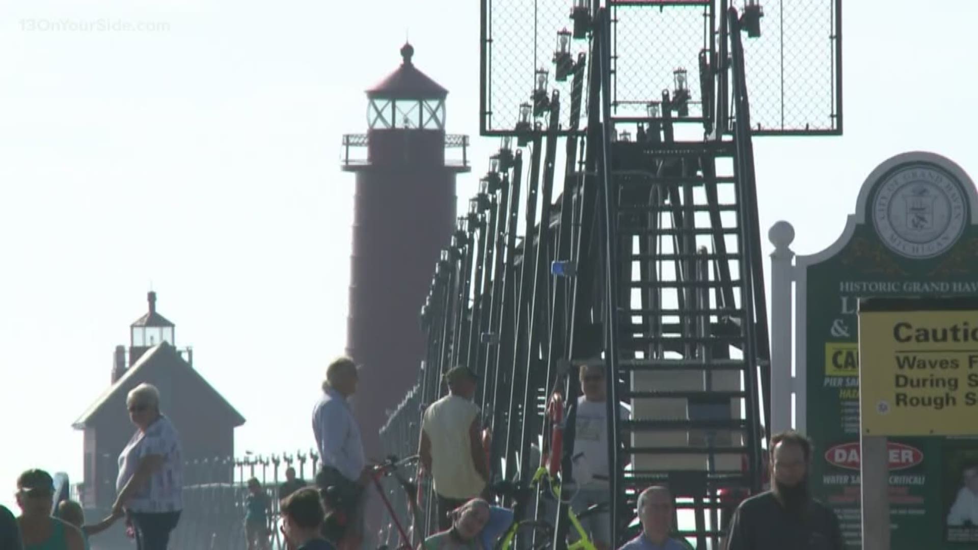 It's been three years since the Grand Haven catwalk has been illuminated. A celebration is being held on Monday night.