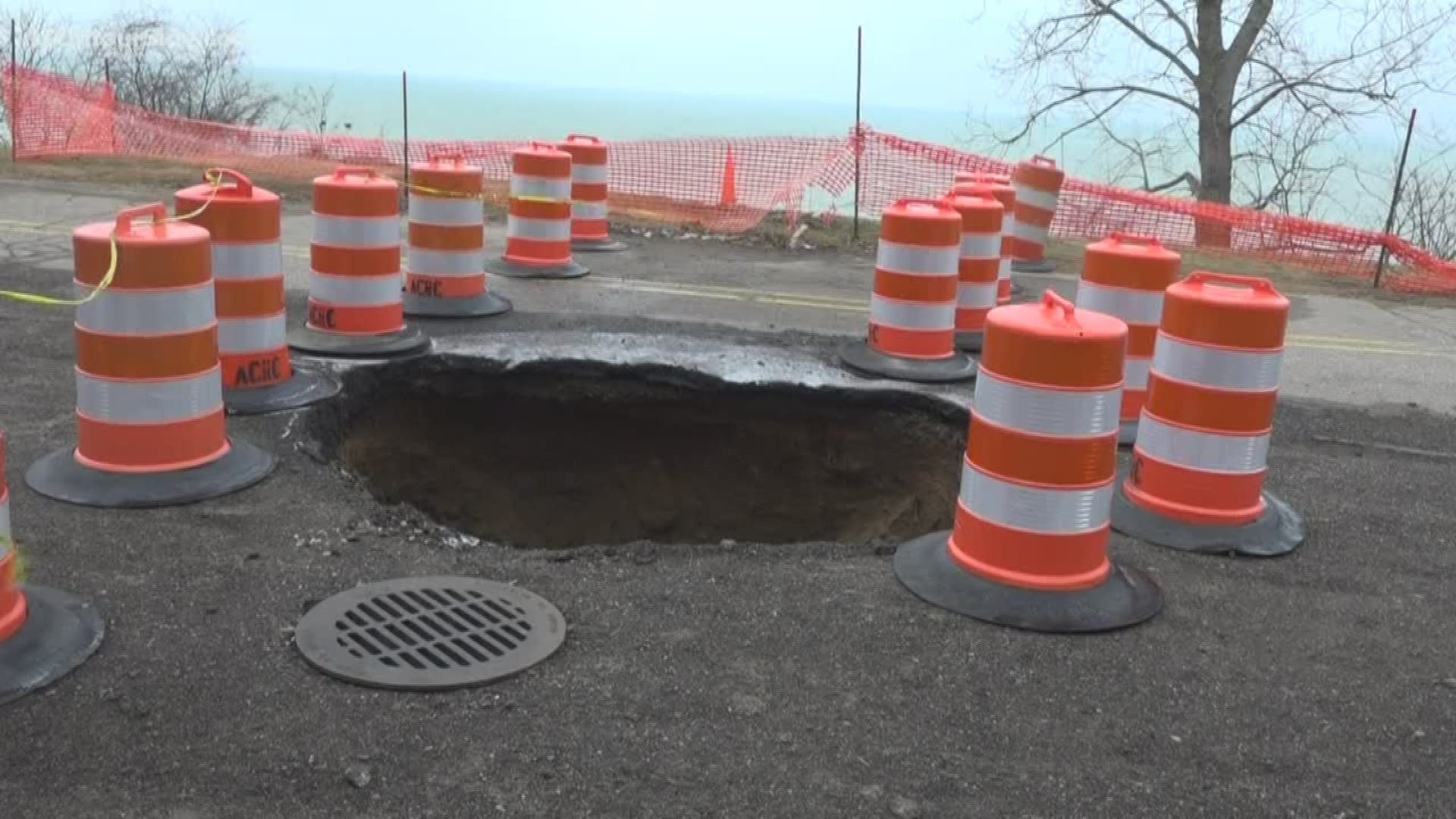 Part of Lakeshore Drive in Saugatuck Township is closed indefinitely due to a large sinkhole.