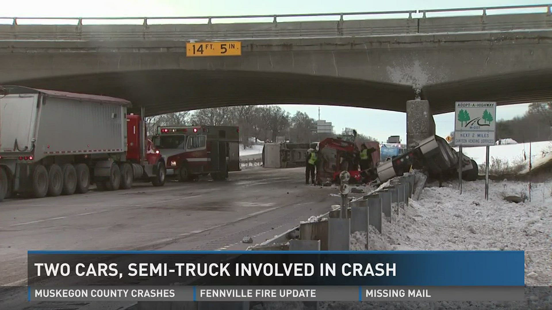 The crash involved three vehicles, one of which was a semi-truck that overturned after colliding with a bridge abutment.