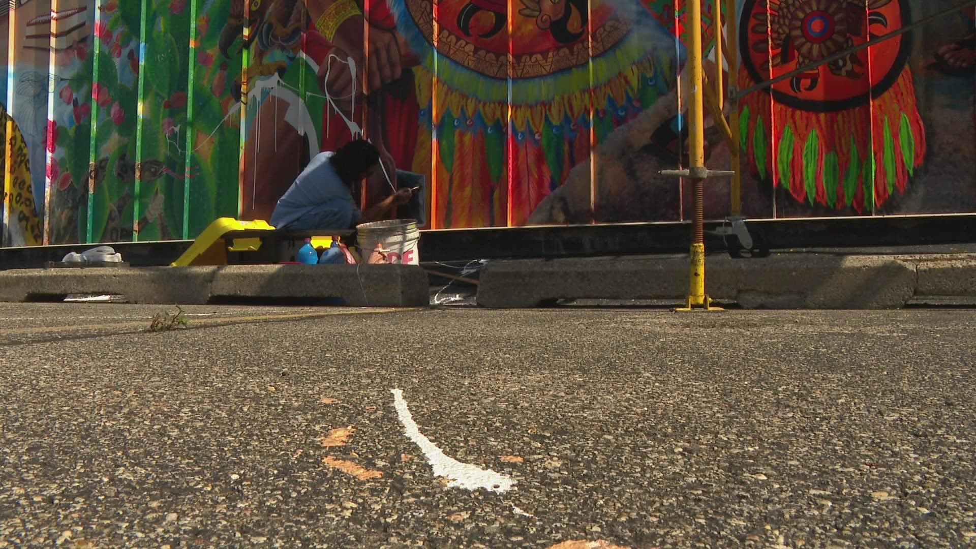 Artist Arturo Morales Romero predicts it will take him an additional 30 hours to fix the vandalism.