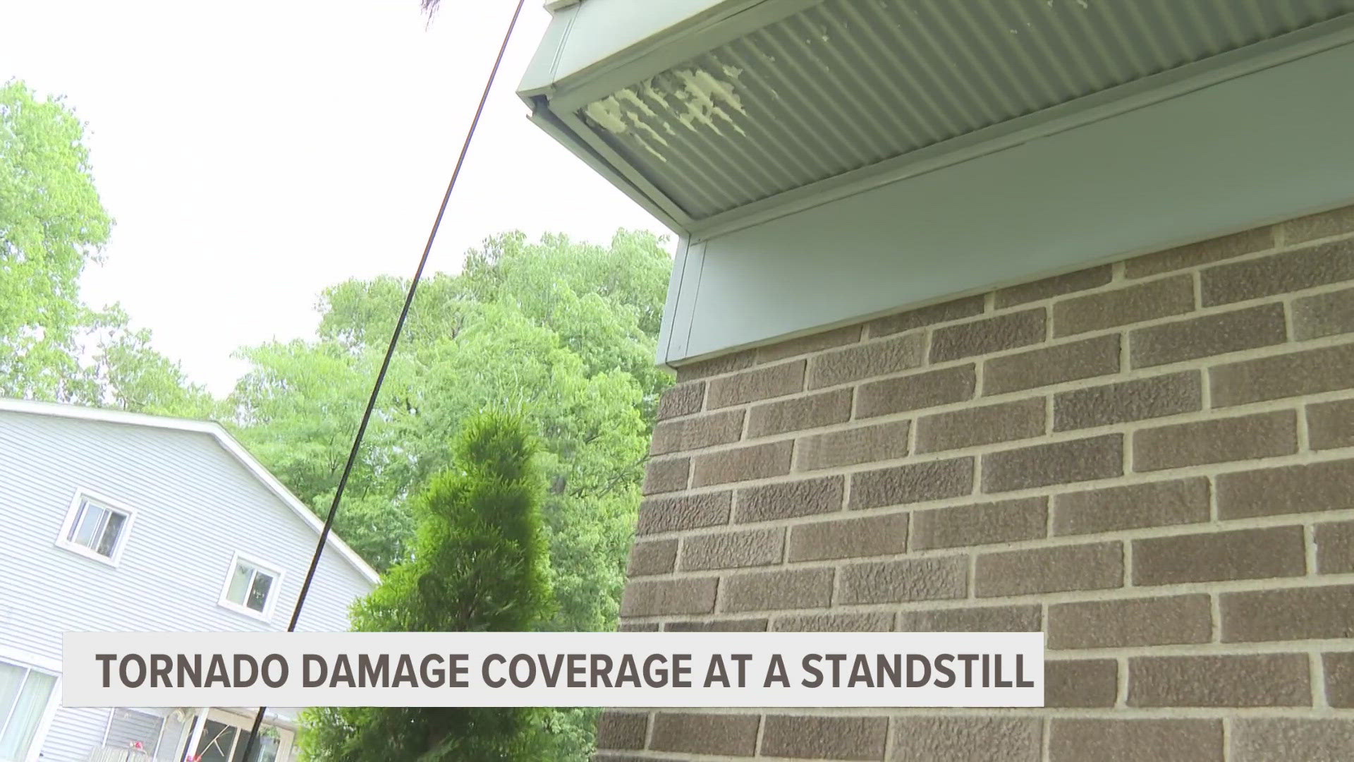 A West Michigan homeowner is at a standstill, trying to repair damage to his home after an EF-1 tornado hit the neighborhood.