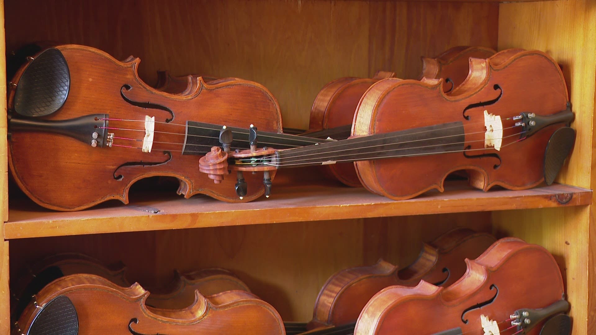 Edwin Hendrickson started hand-making violins 10 years ago. He had no idea how much of an impact his hobby would make on a school district a decade later.