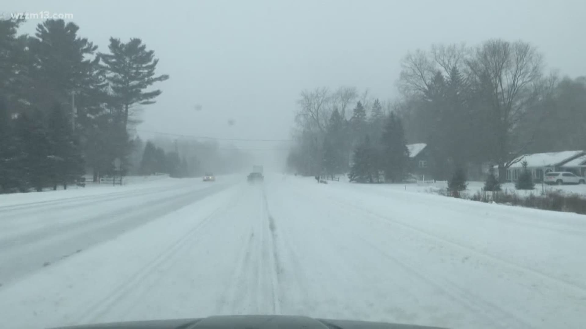 Snow plows working to clear roads after snow storm