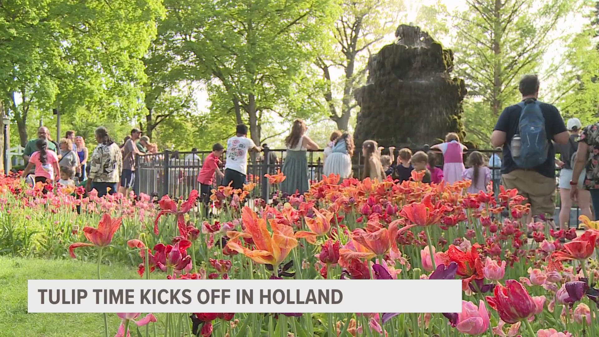 The sound of wooden shoes and music filled the streets of downtown Holland as crowds took in the tulips and the activities across the city.