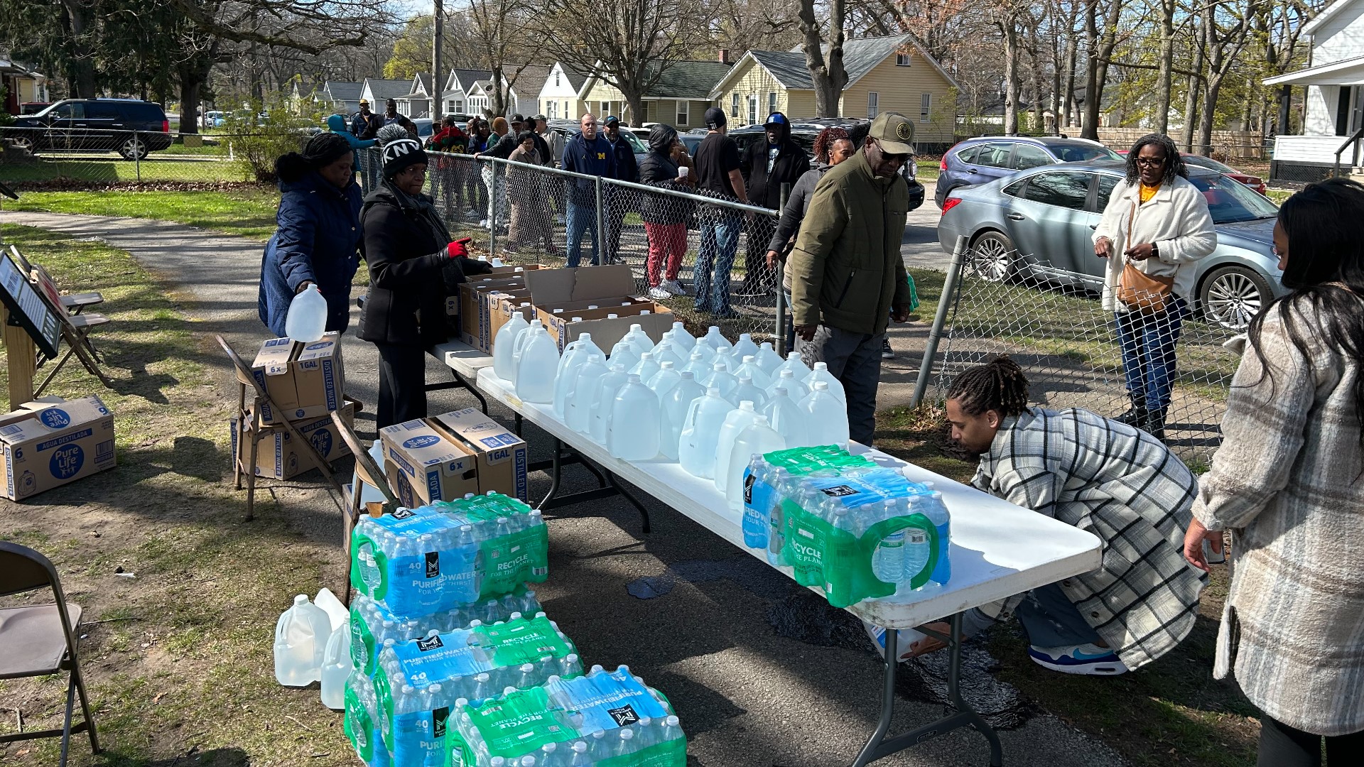 A group of neighbors are distributing water to Muskegon Heights residents following a boil water notice.