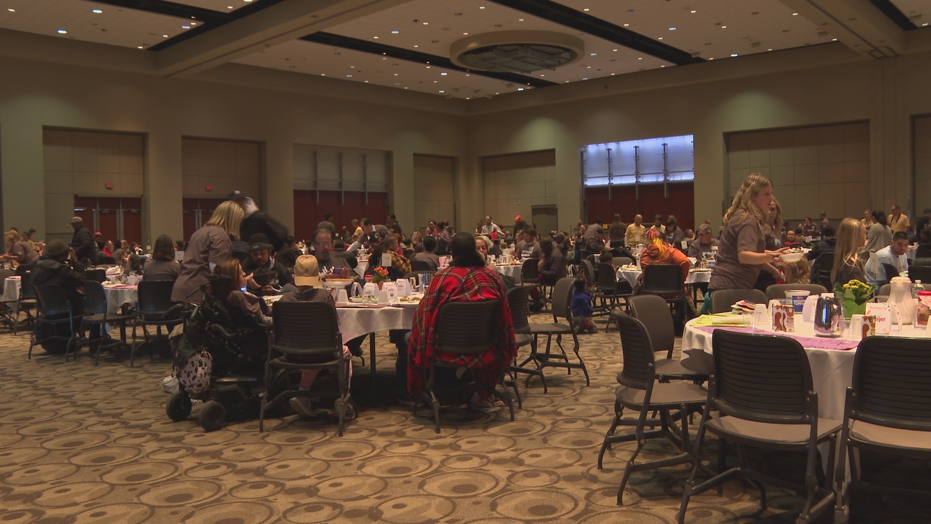 Volunteers served over 180 turkeys at the Mel Trotter Community Meal at DeVos Place.