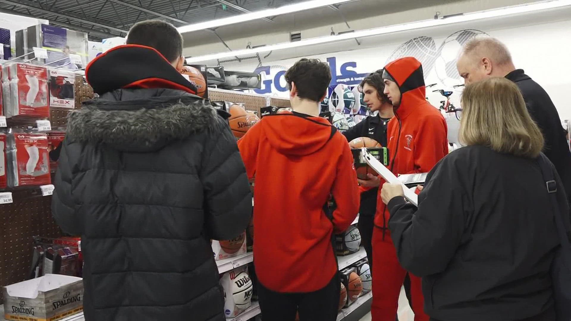 The East Kentwood Boy's Basketball team spent the evening holiday shopping. But not for themselves.