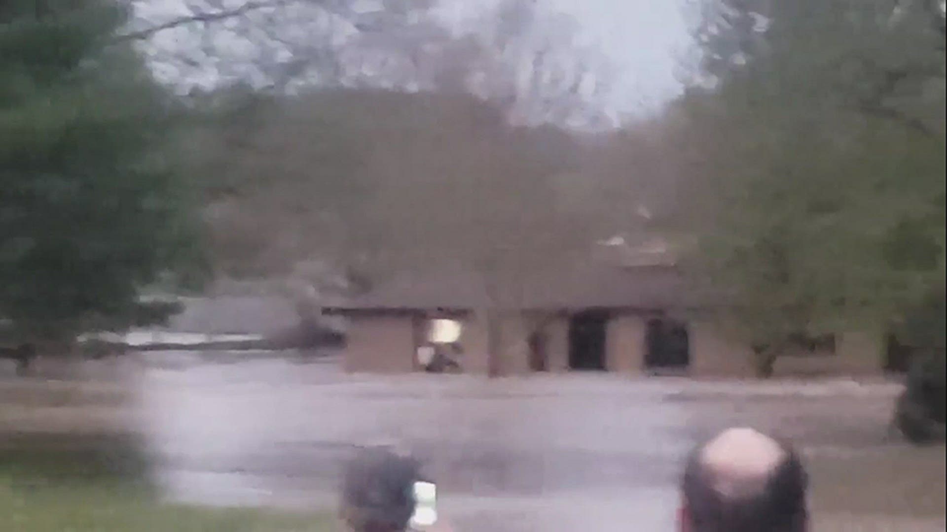 Kyle Lawrence shared this video from Edenville, Michigan on Curtis Rd. of a roof of a house floating down the Tittabawassee River.