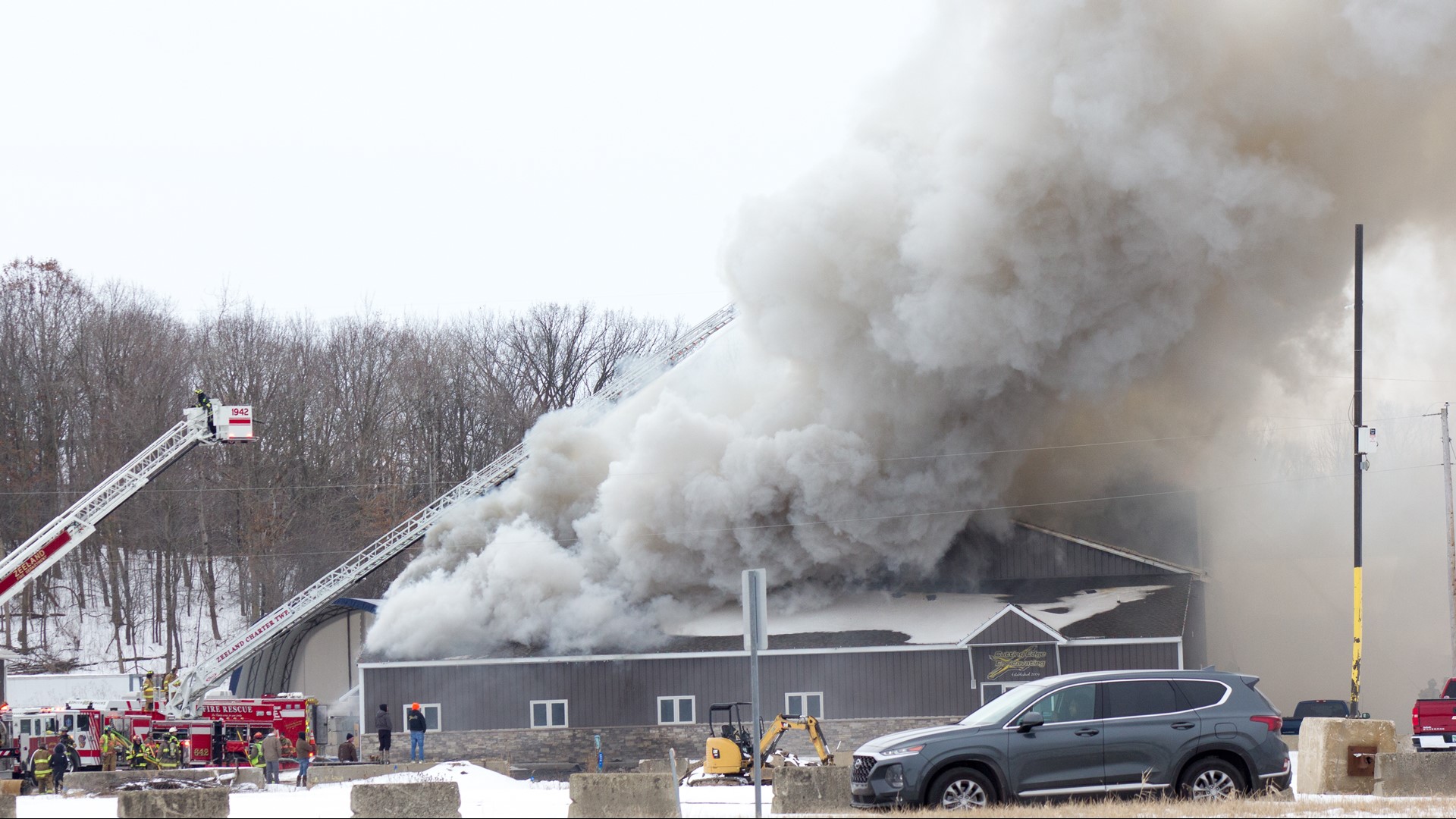 PHOTOS Multiple departments battle commercial fire in Zeeland Township