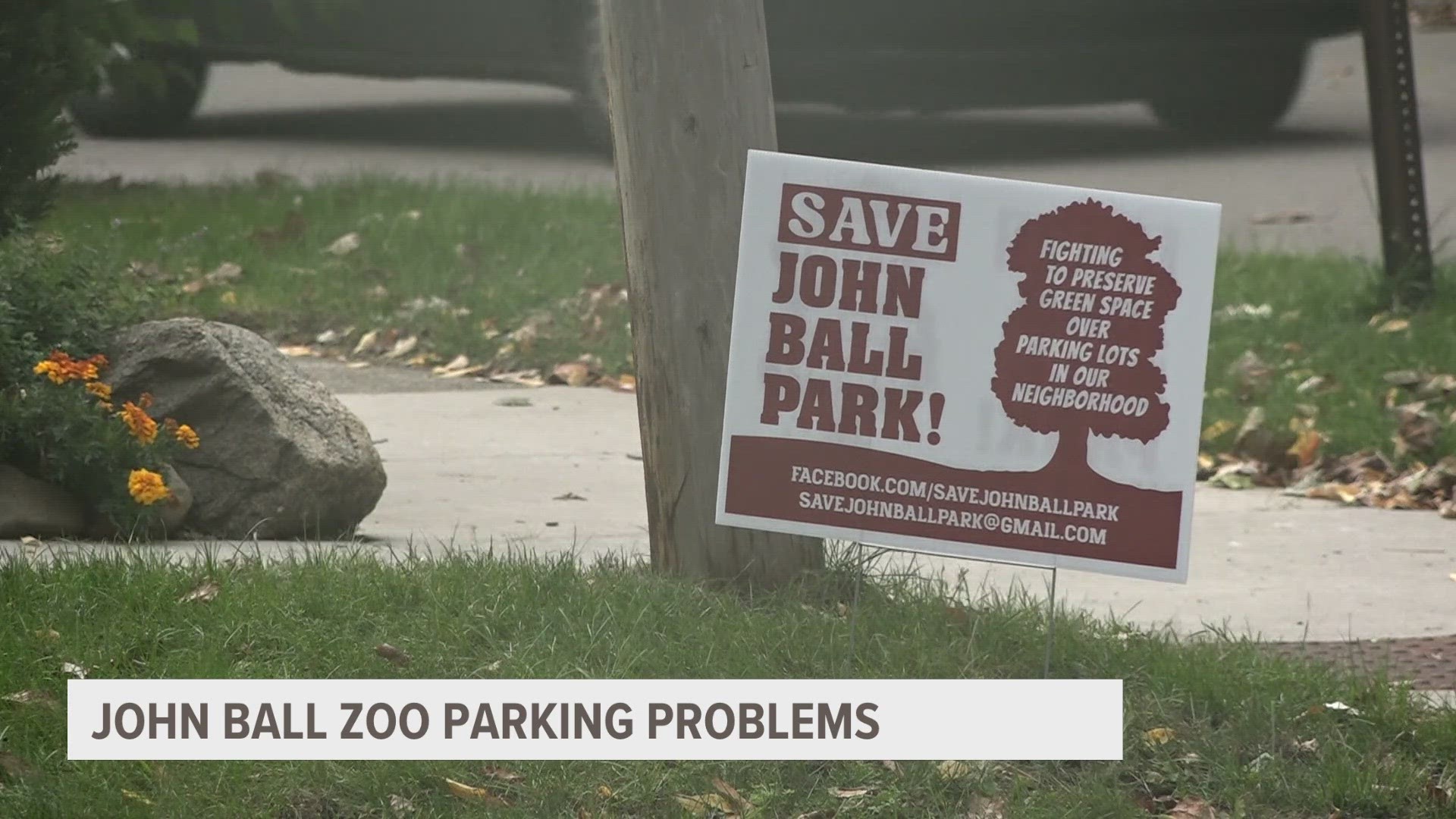 Neighbors next to John Ball Park in Grand Rapids are frustrated with a plan to expand the zoo's parking lot.