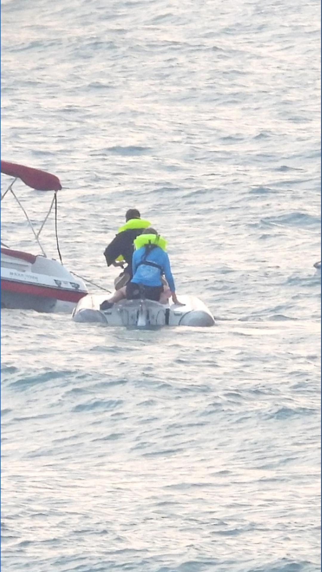 Bystanders help rescue 2 after boat capsizes | wzzm13.com