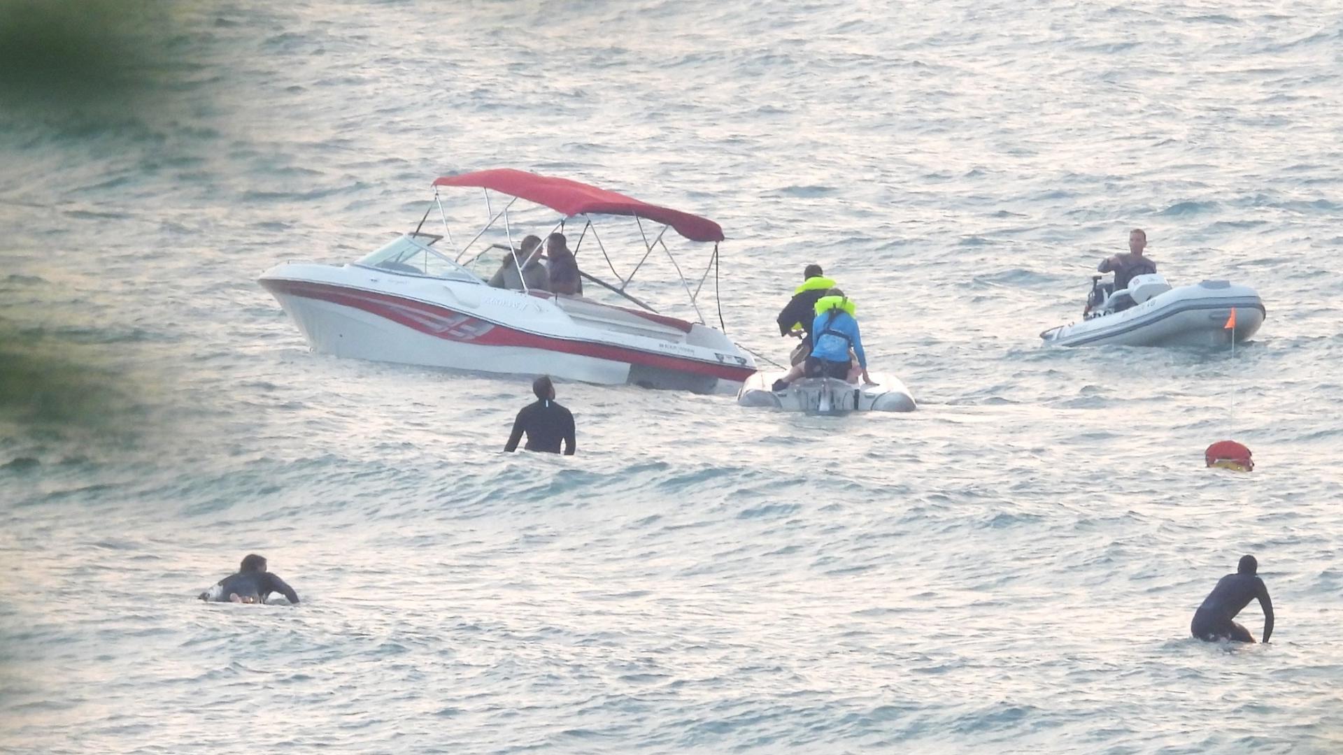 Bystanders help rescue 2 after boat capsizes | wzzm13.com