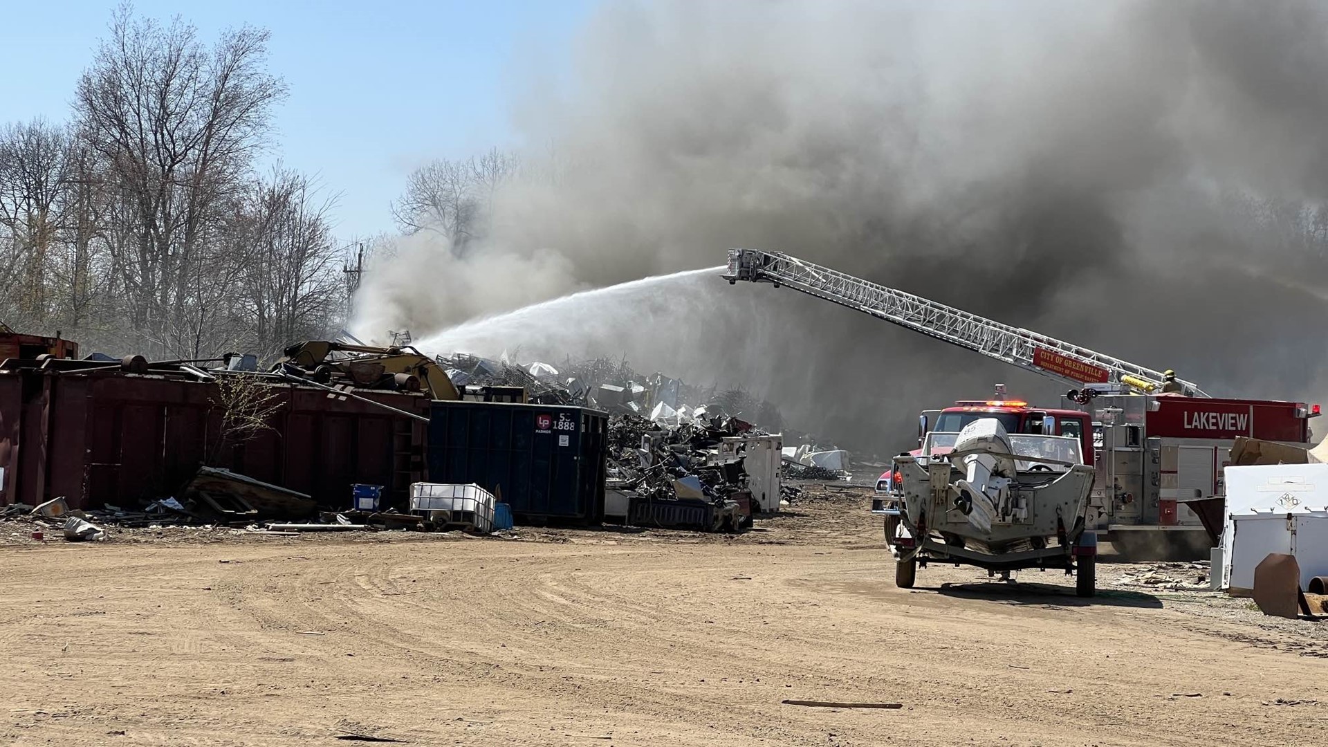 Multiple fire engines responded to the fire at a recycling center north of Greenville.