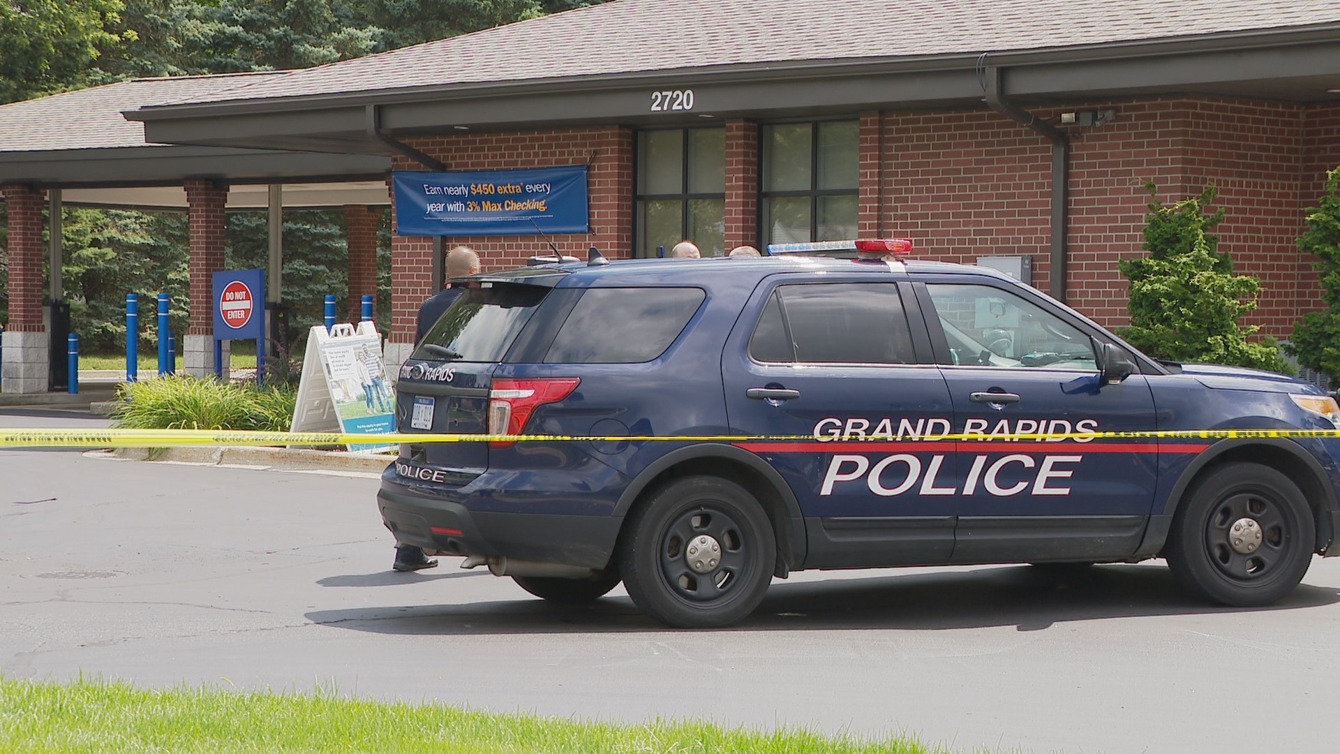 While police are investigating an armed robbery at the Lake Michigan Credit Union branch on Lake Michigan Drive, a witness is still in shock.
