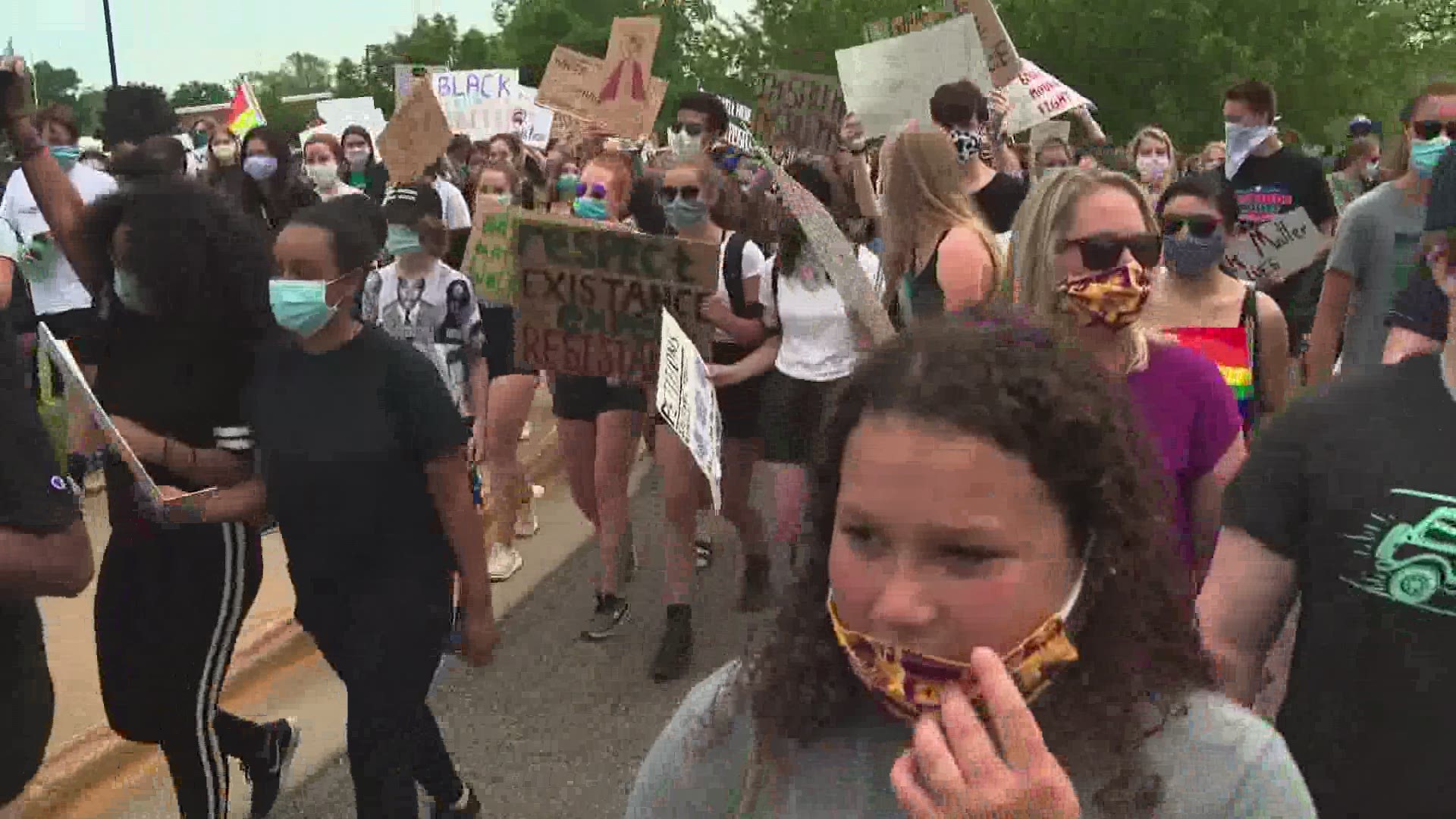 A couple hundred Grand Rapids youth gathered near Reed Lake in East Grand Rapids Friday in a peaceful Black Lives Matter protest.