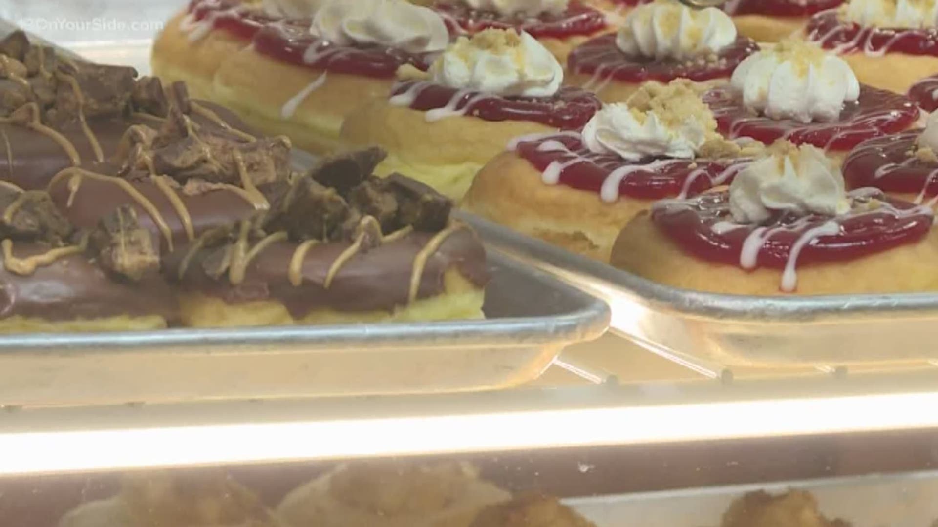 The popular donut shop's third location in West Michigan opened Monday morning.