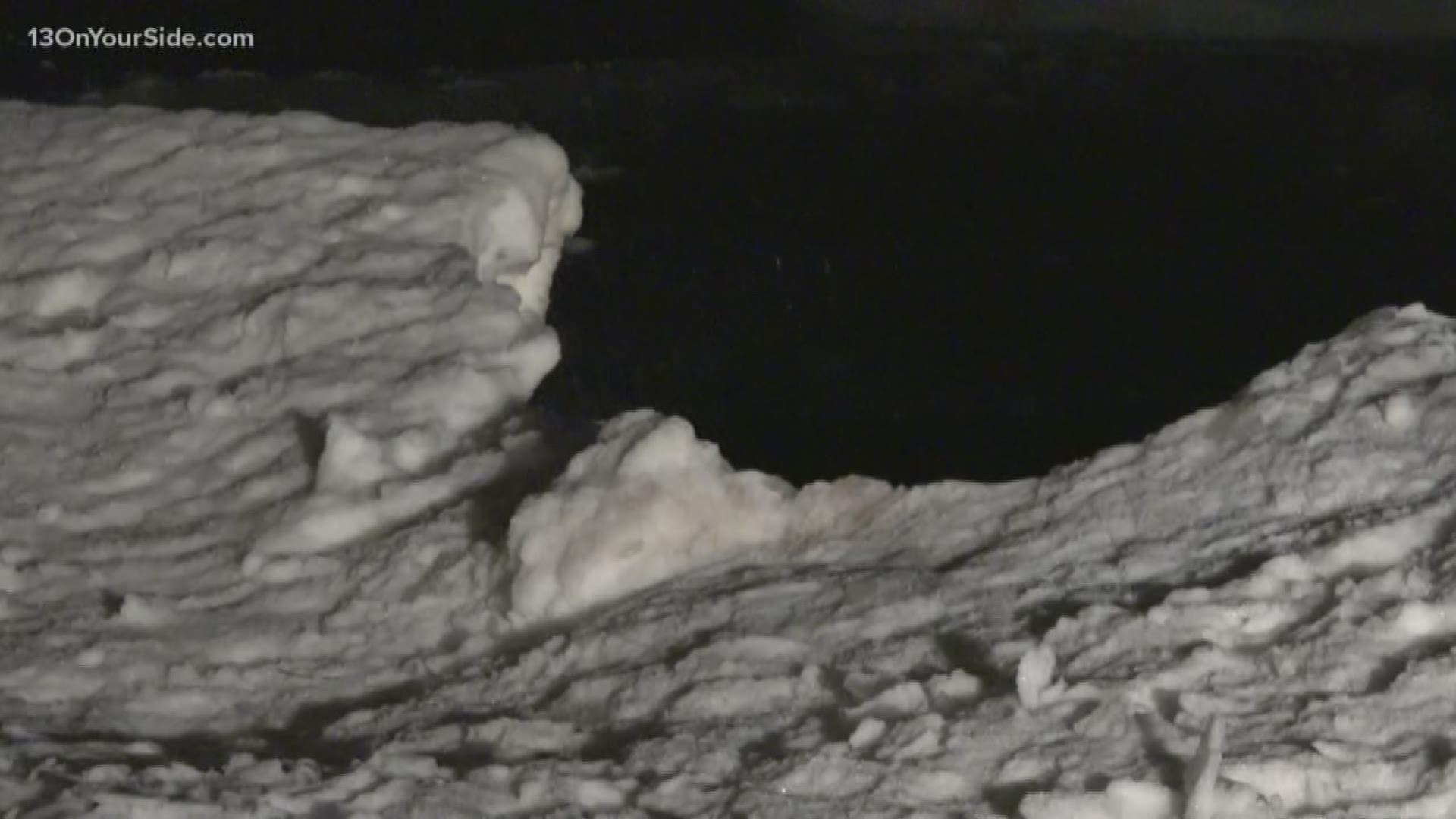 Crews were searching Lake Michigan Tuesday night on a report of a missing man but suspended it due to poor conditions.