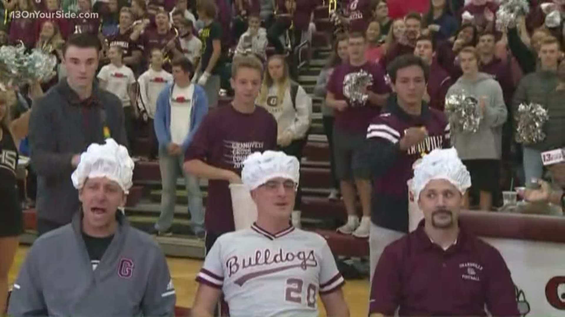 The Bulldogs sit down a couple teachers and staff members for a messy, cheese puff game.