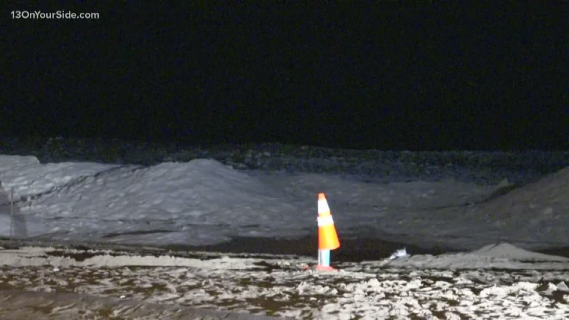 Crews were searching Lake Michigan Tuesday night on a report of a missing man but suspended it due to poor conditions.